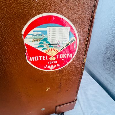 Lot 53 Antique leather suitcase