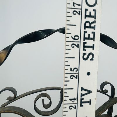 Lot 60 Antique wrought iron magazine rack