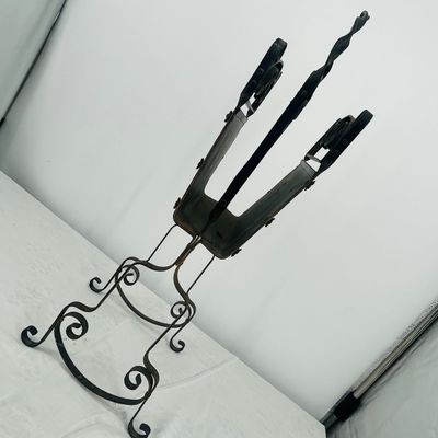 Lot 60 Antique wrought iron magazine rack