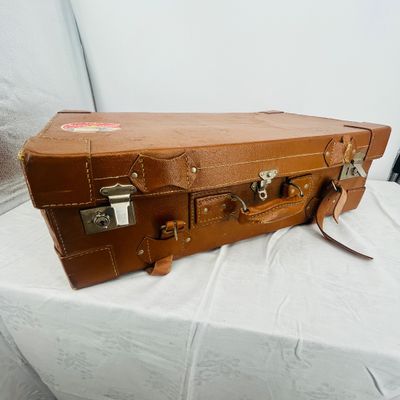 Lot 53 Antique leather suitcase