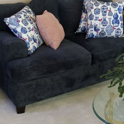 Contemporary Dark Charcoal Upholstered Loveseat with Rolled Arms