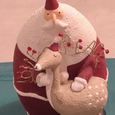 Santa Claus and Reindeer Figurine