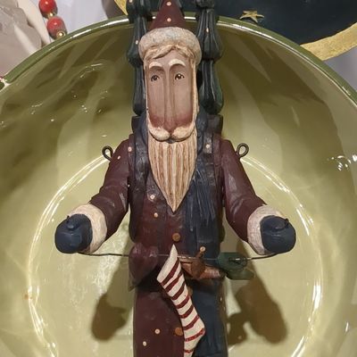 Hand-Carved Folk Art Santa Figurine with Stocking and Ornaments