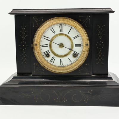 Sale Photo Thumbnail #18: Waterbury Clock Co. Parcel-Gilt and Ebonized Mantel Clock