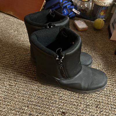 Sale Photo Thumbnail #75: Pair of black zippered winter boots with padded collars, showing light wear.