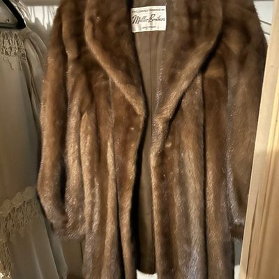 Sale Photo Thumbnail #79: Vintage mid-century brown mink fur coat designed by Miller Brothers of Baltimore, featuring a shawl collar and satin lining.