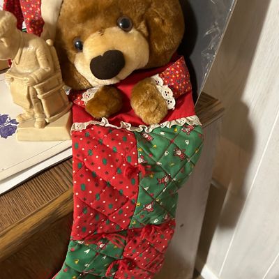Sale Photo Thumbnail #54: Vintage quilted Christmas stocking featuring a plush teddy bear wearing a nightcap and matching red floral cuffs.
