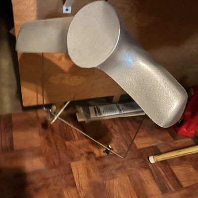 Sale Photo Thumbnail #51: Silver-painted plastic shoulder form hanger with a wire pants bar, designed for displaying clothing.