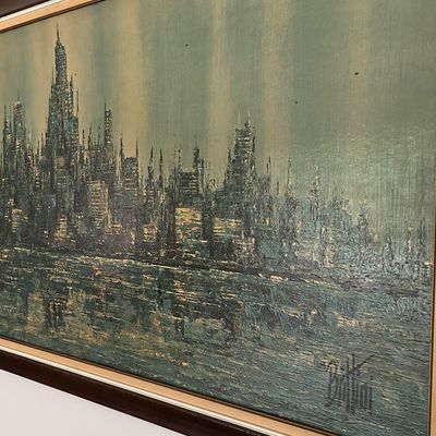 Sale Photo Thumbnail #133: Mid-century modern textured oil painting of a city skyline by Bettini, featuring a green and gold color palette in a dark wood frame.