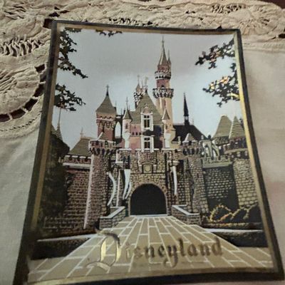 Sale Photo Thumbnail #22: Vintage Disneyland Sleeping Beauty Castle souvenir glass tray with gold-tone accents, circa 1960s.