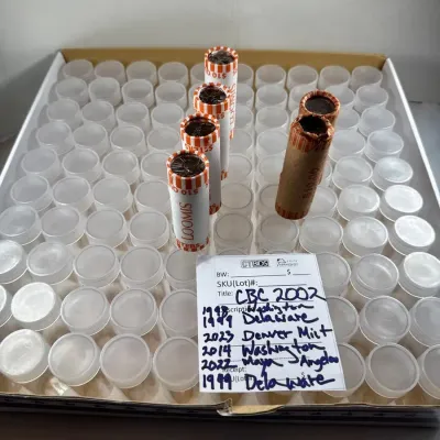 Six Quarter Rolls And Unused Quarter Coin Tubes