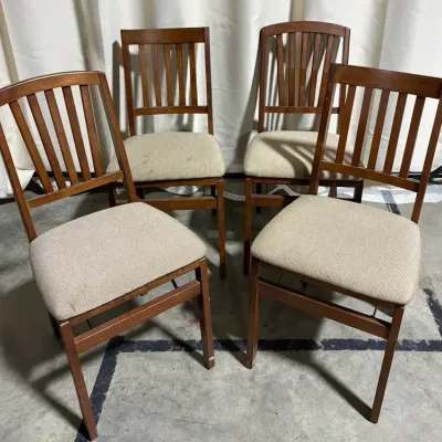 Four Folding Upholstered Fabric Seat Chairs