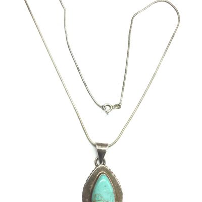 Navajo necklace with turquoise pendant.