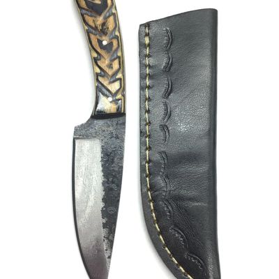 Steel bladed knife