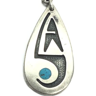 Navajo turquoise overlay pendant