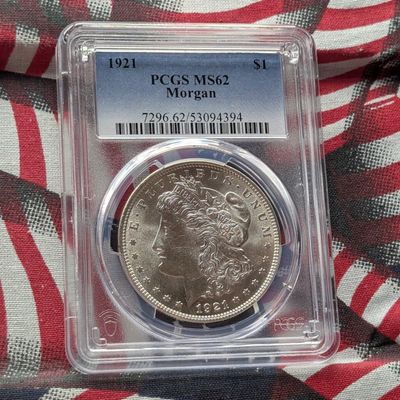 Sale Photo Thumbnail #48: 1921 Morgan 90% Silver Dollar - PCGS MS62