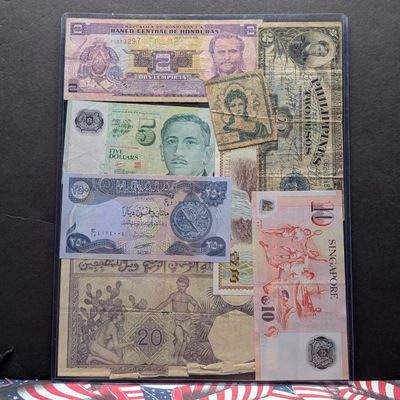 Sale Photo Thumbnail #444: (8) Assorted World Currency Notes in Display