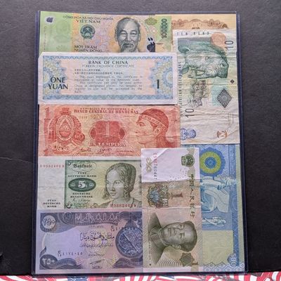 Sale Photo Thumbnail #394: (9) Assorted World Currency Notes in Display