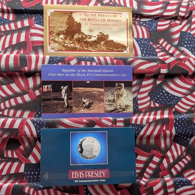 Sale Photo Thumbnail #422: 1992 Marshall Islands $5 The Heroes of the Battle of Midway, 1989 Marshalls Island $5 The First Men on the Moon, & 1993 Marshall Islands $5 Elvis Presley - All in Info Displays