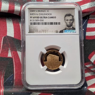 Sale Photo Thumbnail #60: 2009-S PROOF Bronze Lincoln Birth & Childhood Cent - NGC PF69 RD ULTRA CAMEO