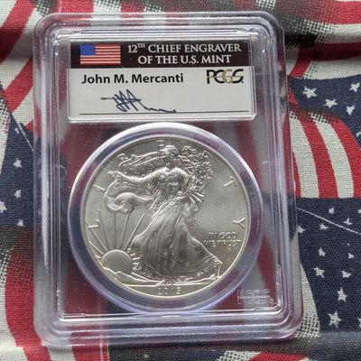 Sale Photo Thumbnail #233: 2015 American Silver Eagle 1 Troy Oz. .999 Silver - PCGS MS70 - First Strike in John M. Mercanti Signature Case