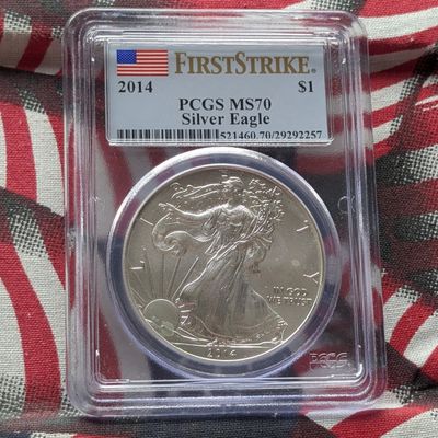 Sale Photo Thumbnail #390: 2014 American Silver Eagle 1 Troy Oz. .999 Silver - PCGS MS70 - First Strike
