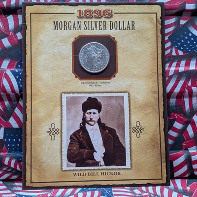 Sale Photo Thumbnail #336: UNC - 1896 Morgan 90% Silver Dollar in Wild Bill Hickok Info Display Card w/ Commemorative Stamp