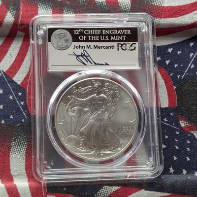 Sale Photo Thumbnail #331: 2017-(W) American Silver Eagle 1 Troy Oz. .999 Silver - PCGS MS70 - First Strike #1 of 1000 in John M. Mercanti Signature Case