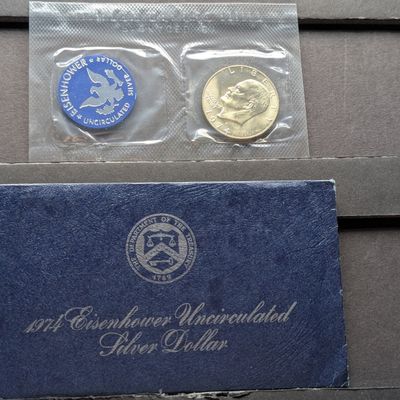 Sale Photo Thumbnail #136: 1974-S Eisenhower 40% Silver Uncirculated Blue Pack Dollar
