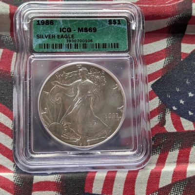 Sale Photo Thumbnail #270: 1986 American Silver Eagle 1 Troy Oz. .999 Fine Silver ICG MS69 - First Year Issue