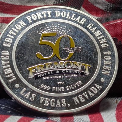 Sale Photo Thumbnail #313: Limited Edition .999 FINE SILVER (Whole Token - 1.65 oz.) Freemont Hotel & Casino 50th Anniv. $40 Gaming Token in Capsule