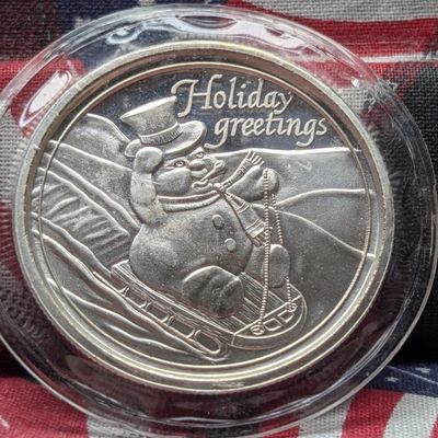 Sale Photo Thumbnail #249: 1 oz. .999 FINE SILVER Holiday Greetings - Snowman Sledding Designed Round