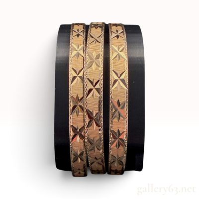 A Trio of 14K Yellow Gold Diamond Cut Semanario Bangle Bracelets