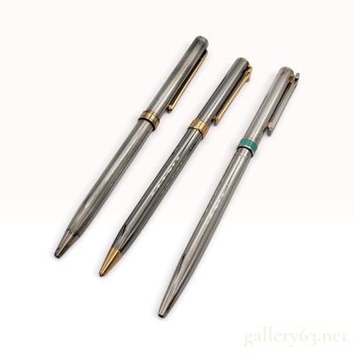 A Trio of Tiffany and Co Sterling Silver and Gemset Writing Instruments