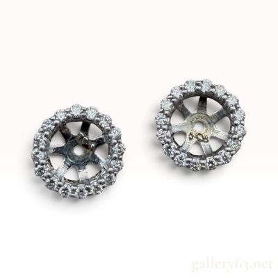 A Pair of 14K White Gold and Natural Diamond Halo Earring Jackets
