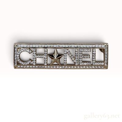 Vintage Chanel Rhinestone Logo Star Pale Gold-Tone Brooch
