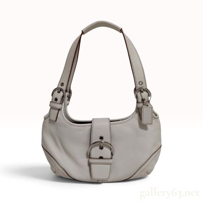 Coach Soho Buckled Flap Hobo Bag in Ivory Leather