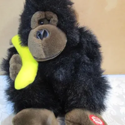 Sale Photo Thumbnail #620: 11" Gorilla sings "Bananas Over You" and vibrates takes 2 AA batteries not included. Aviator bear is 7", Bear with anchor is 7" tall. See  pictures