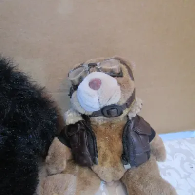 Sale Photo Thumbnail #615: 11" Gorilla sings "Bananas Over You" and vibrates takes 2 AA batteries not included. Aviator bear is 7", Bear with anchor is 7" tall. See  pictures