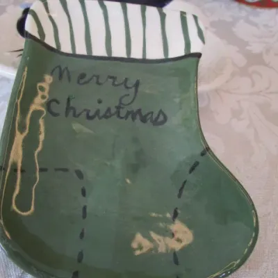 Sale Photo Thumbnail #515: One of the mugs is a soup mug, candy dish 5-1/2" x 6" , Tray, spoon rest & Santa face sack are hand painted See pictures