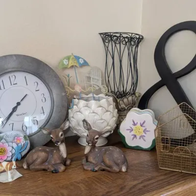 Eclectic Cottagecore and Vintage-inspired Vignette Features An Arrangement Of Home Decor Accents