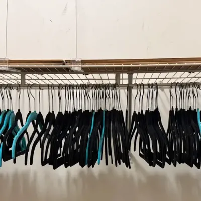 Collection of Black & Teal Hangers - Closet Full