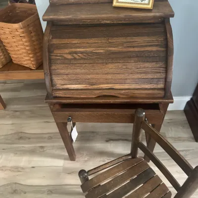 Sale Photo Thumbnail #4: Vintage child-sized oak roll-top desk with a matching wooden slat-seat chair.