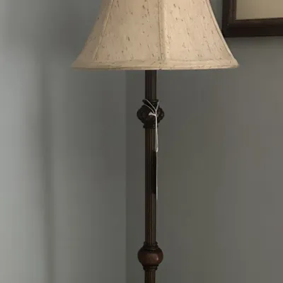 Sale Photo Thumbnail #122: Traditional metal buffet lamp featuring a fluted column with decorative turnings and a bell-shaped fabric shade.