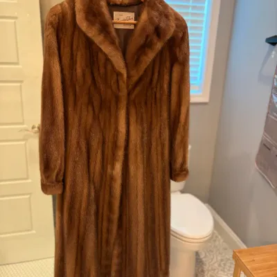 Sale Photo Thumbnail #42: Vintage full-length brown mink fur coat featuring a shawl collar and rich, glossy pelts, in well-preserved condition.