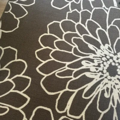 Sale Photo Thumbnail #185: Contemporary area rug featuring a bold, large-scale floral pattern in dark brown and off-white.