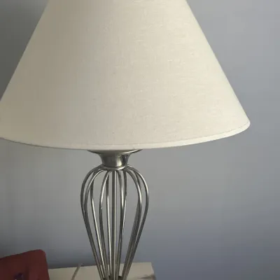 Sale Photo Thumbnail #118: Contemporary table lamp featuring a brushed nickel cage-style base and a classic white fabric empire shade.