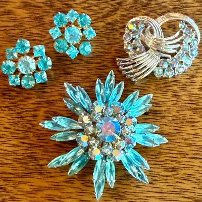 
(4) Blue Aurora Borealis Rhinestone Brooches (2) Coro