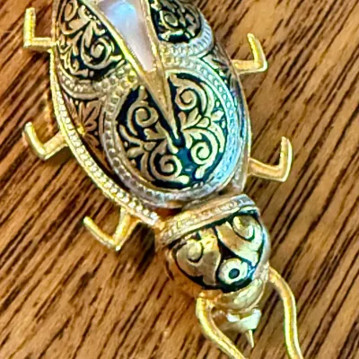 
Damascene Spain Bug With Faux Pearl Brooch