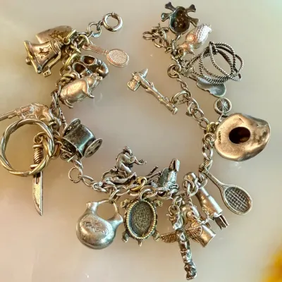 
Vintage Sterling Silver 8 Inch Loaded Charm Bracelet - Weight 37.19 Grams